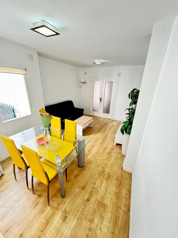 Salón-comedor común · zona de comedor y vista hacia el salón