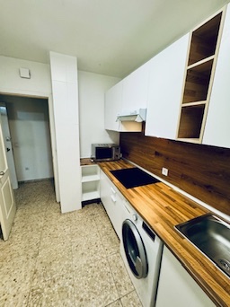 Shared kitchen · view from the entrance and storage area