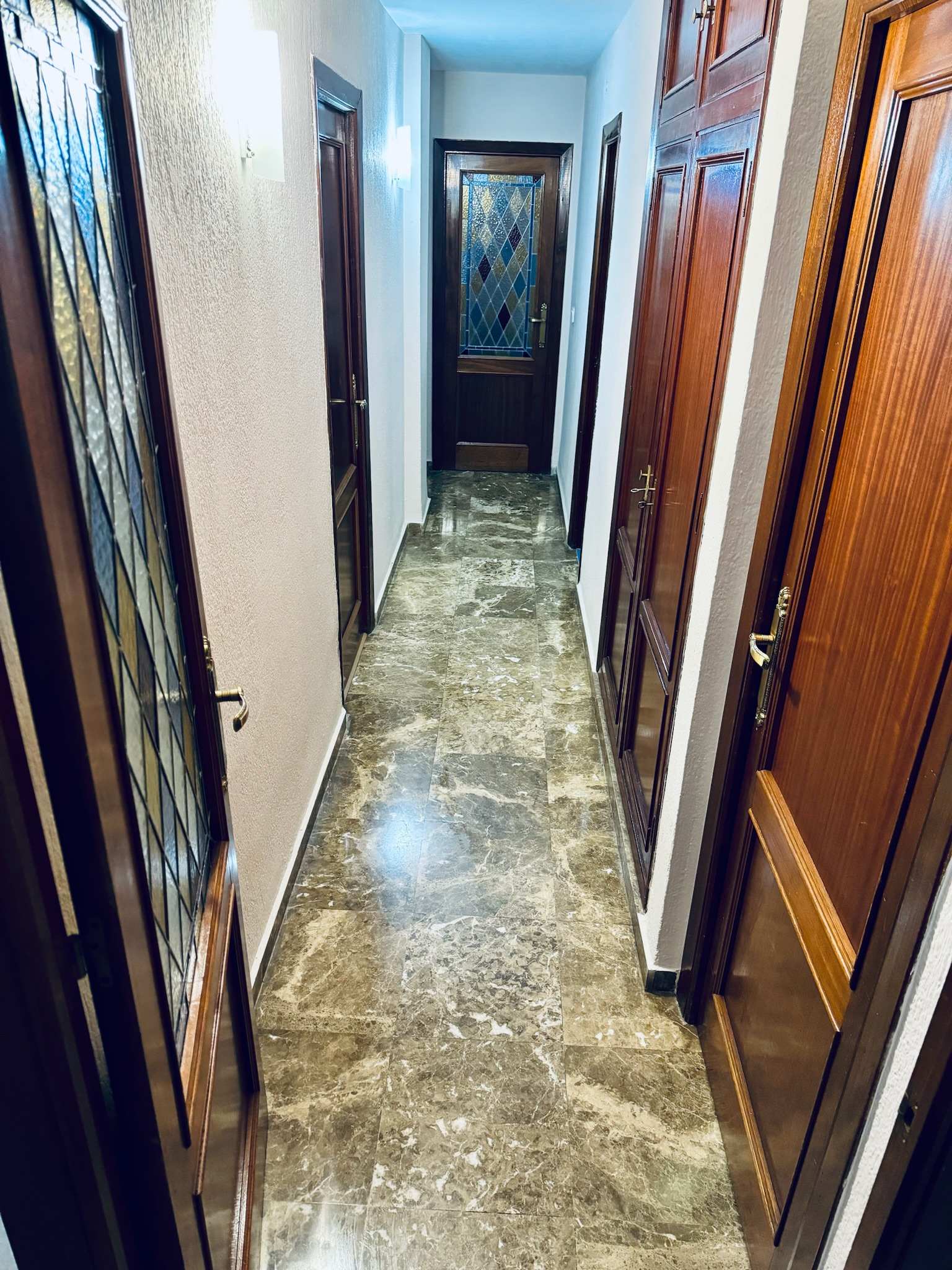 Individual económica · Pasillo de mármol · zona común